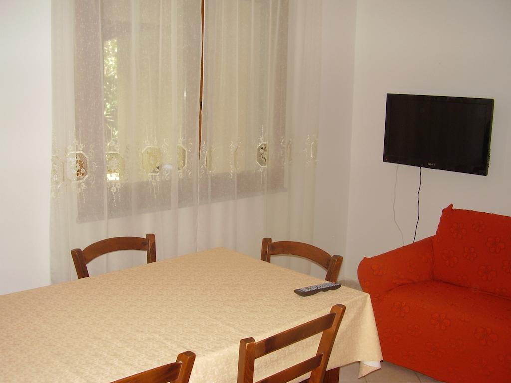 Casa Giovanna Porto Pino Ruang foto