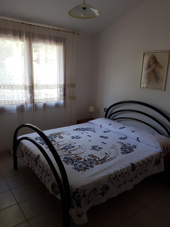Casa Giovanna Porto Pino Bagian luar foto